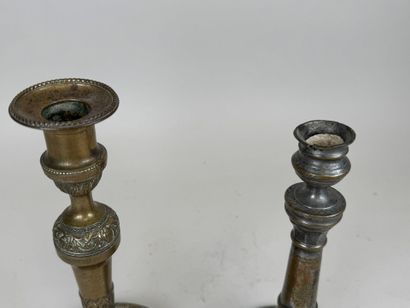 Two ormolu torches, one decorated with vases...