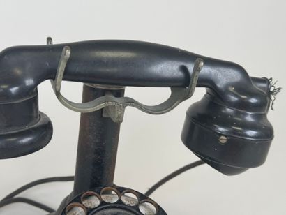 ERICSON telephone company.
Metal and bakelite...