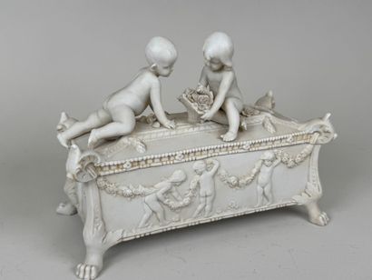 Small rectangular bisque bonbonnière decorated...