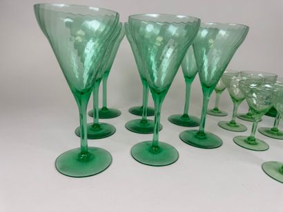 Part of a glass service in green colored...