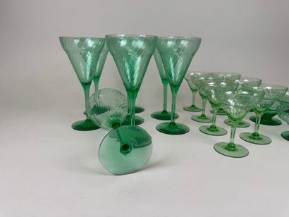 Part of a glass service in green colored...