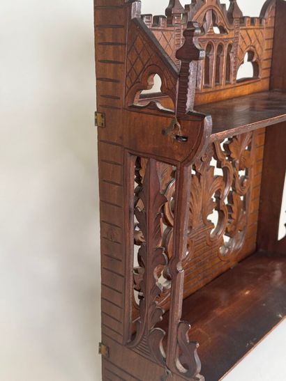 Small shelf in molded and carved wood with...