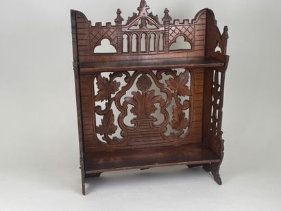 Small shelf in molded and carved wood with...