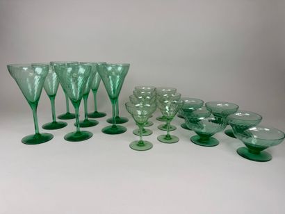 Part of a glass service in green colored...