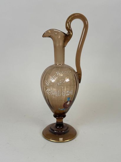Pichet en verre coloré à décor émaillé marqué...
