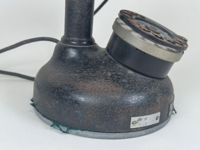 ERICSON telephone company.
Metal and bakelite...
