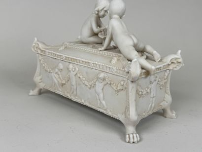 Small rectangular bisque bonbonnière decorated...