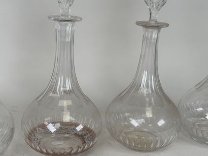 Quatre carafes en cristal,
XIXe.
H. 30 cm...
