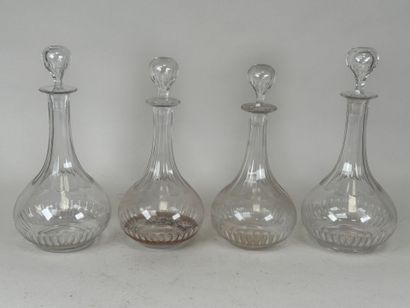Quatre carafes en cristal,
XIXe.
H. 30 cm...