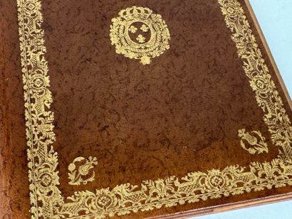 Small leather blotter with embossed and gilded...
