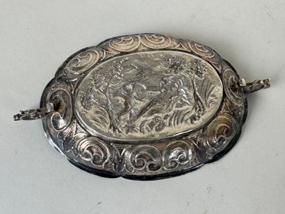 Small oval repoussé silver bowl decorated...