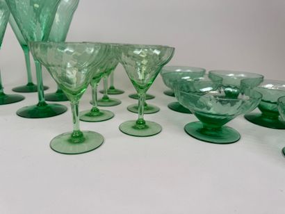 Part of a glass service in green colored...