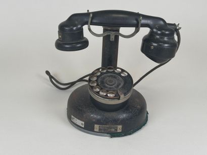 ERICSON telephone company.
Metal and bakelite...