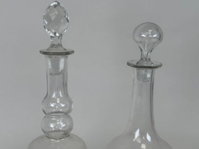 Deux carafes en verre à décor émaillé et...