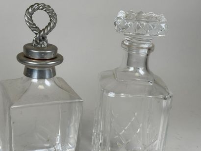 Two crystal and glass whisky or liqueur decanters,...
