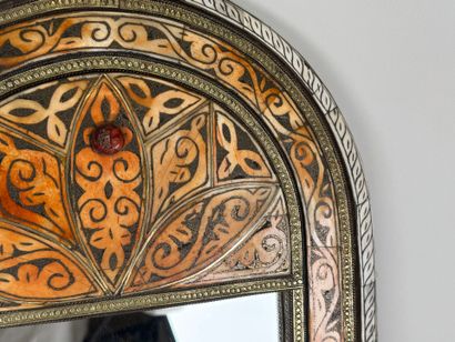 Copper alloy mirror with repoussé decoration...