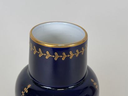 Porcelain vase on a kiln-blue ground with...