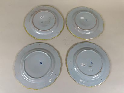 PORQUE-BEAU. 
Série de quatre assiettes à...