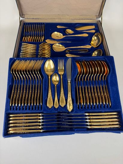 Gilded metal and metal menagère set including...