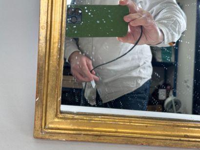Pair of molded and gilded wood framed mirrors....