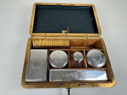 Brown leather travel case, numbered on the...