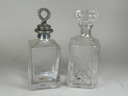 Two crystal and glass whisky or liqueur decanters,...