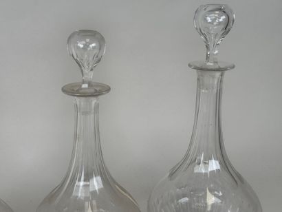 Quatre carafes en cristal,
XIXe.
H. 30 cm...