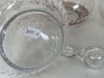 Quatre carafes en cristal,
XIXe.
H. 30 cm...