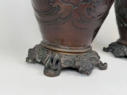 JAPAN, early 20th c. Pair of patinated regula...
