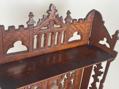 Small shelf in molded and carved wood with...