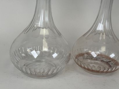 Quatre carafes en cristal,
XIXe.
H. 30 cm...