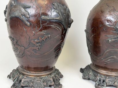 JAPAN, early 20th c. Pair of patinated regula...