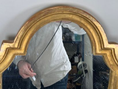 Pair of molded and gilded wood framed mirrors....