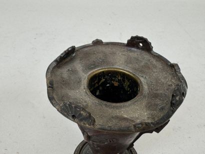 ASIA, 20th C. Small patinated bronze candlestick...