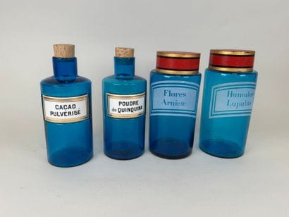 Two pairs of colored glass medicine bottles...