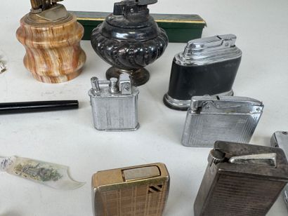 Collection of 14 metal and onyx lighters.
Two...