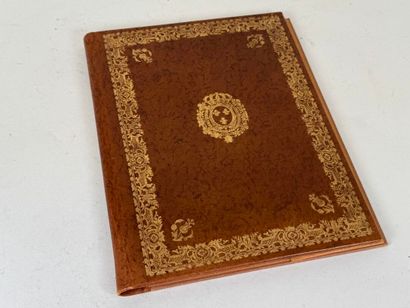Small leather blotter with embossed and gilded...