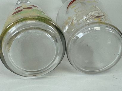 Deux carafes en verre à décor émaillé et...