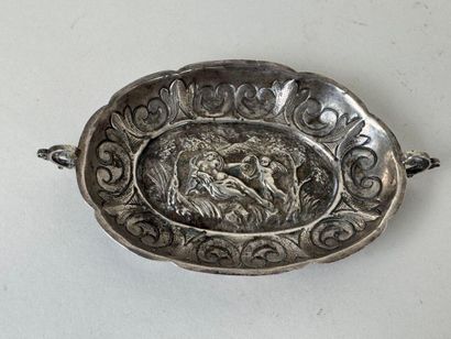Small oval repoussé silver bowl decorated...