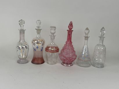 Six carafons en verre à décor émaillé et...