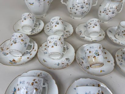 Polychrome and gold porcelain coffee service...