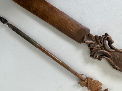 Carved wood letter opener decorated with...