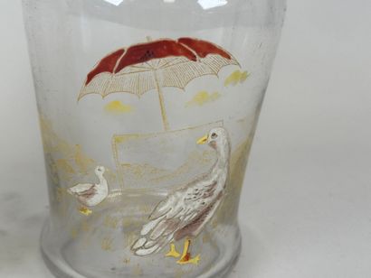 Deux carafes en verre à décor émaillé et...