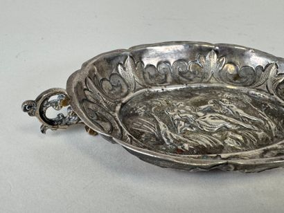 Small oval repoussé silver bowl decorated...