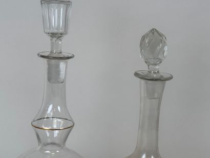 Deux carafes en verre à décor émaillé polychrome...
