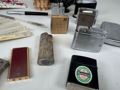 Collection of 14 metal and onyx lighters.
Two...