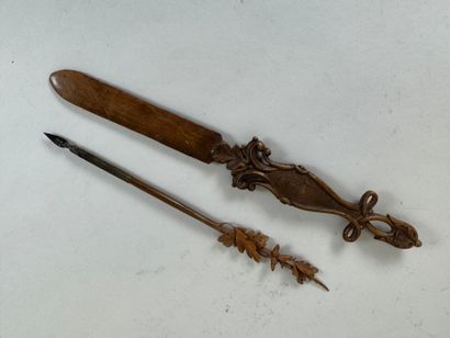 Carved wood letter opener decorated with...