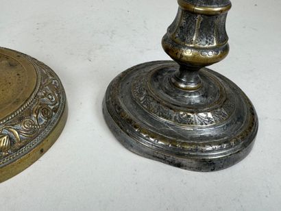 Two ormolu torches, one decorated with vases...