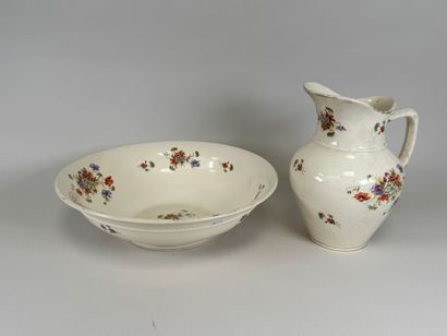 HAMAGE.
A polychrome and gold earthenware...