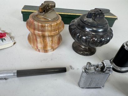Collection of 14 metal and onyx lighters.
Two...